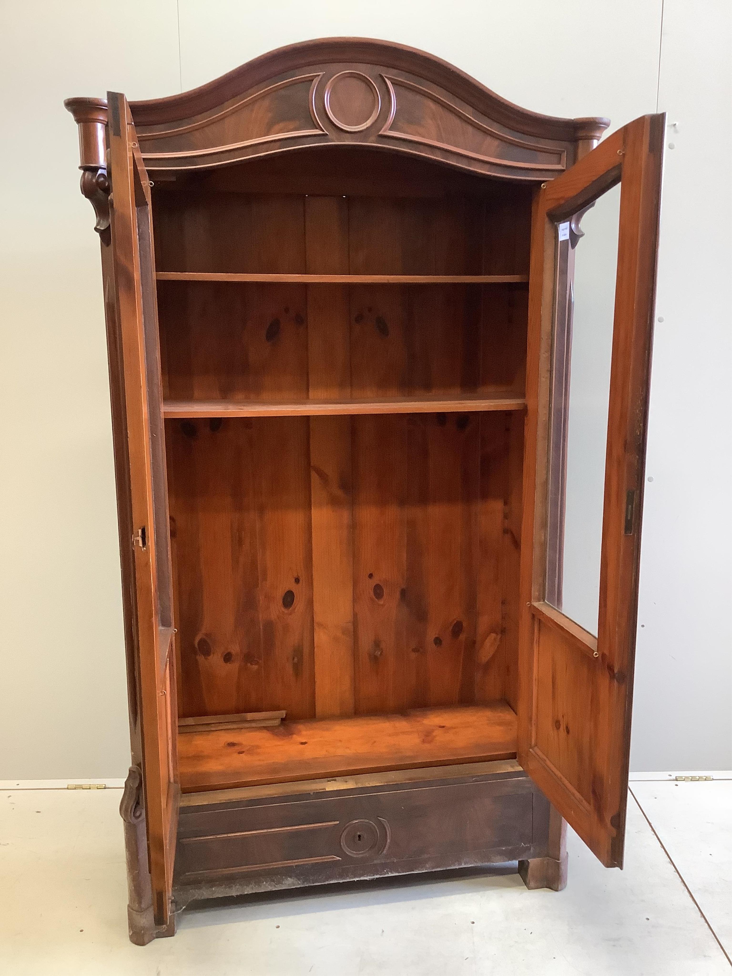 A small 19th century French glazed mahogany armoire, width 104cm, depth 41cm, height 186cm. Condition - fair